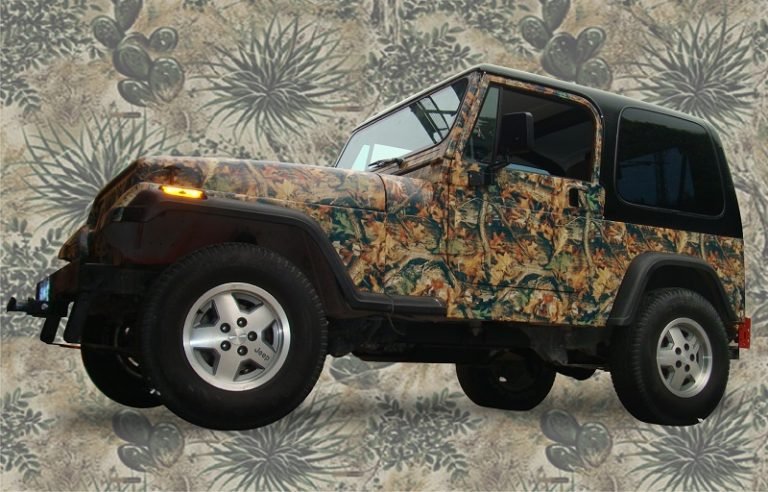 Camo Wrap of a short Jeep on a desert Camo background.