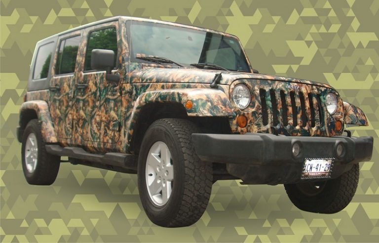 3/4 view of a large Jeep with Camo Wrap.