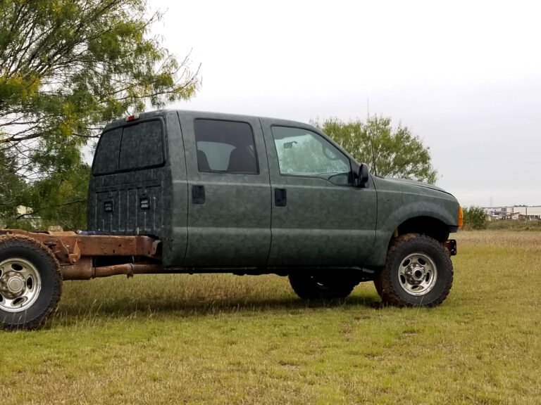 Camo wrapped flatbed truck, passenger (14)