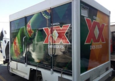 Close-up of a XX Beer delivery box Truck Wrap.