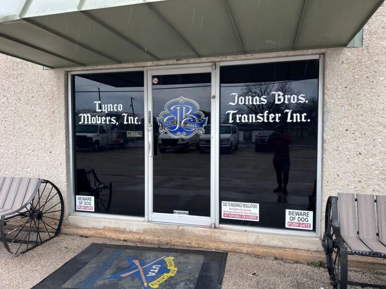Logo and company names in office front door windows