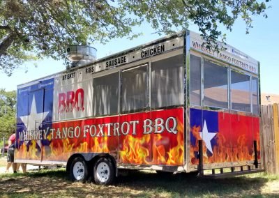 Image of rear and personnel facing side of WTF Food Trailer Wrap.