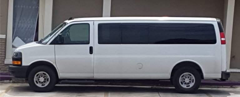 Passenger van before receiving Window Decals.