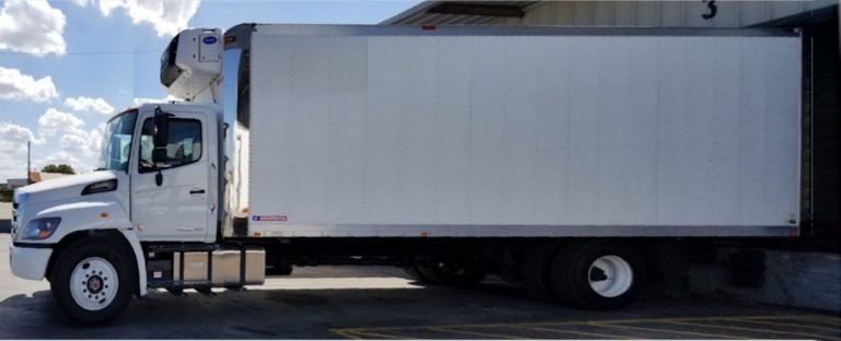 Truck Wrap of a 27' refrigerated delivery box truck with image of multiple fruits, logo, slogan and contact information. The cabin door is also branded with logo and contact info decals.